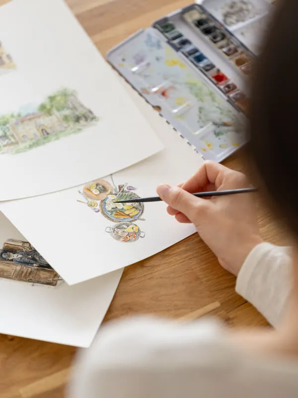 Une aquarelle en cours, la palette à côté